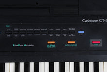 Load image into Gallery viewer, Casio Casiotone CT-607 Keyboard with Power Supply Manual and Original Box