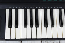 Load image into Gallery viewer, Casio Casiotone CT-607 Keyboard with Power Supply Manual and Original Box