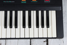 Load image into Gallery viewer, Casio Casiotone CT-607 Keyboard with Power Supply Manual and Original Box