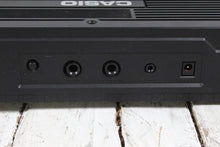 Load image into Gallery viewer, Casio Casiotone CT-607 Keyboard with Power Supply Manual and Original Box