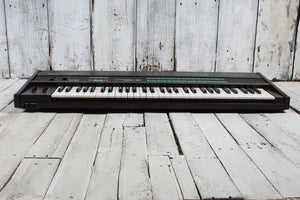 Yamaha Vintage 1980s DX7 Digital Synthesizer 61 Key Keyboard w Case & Cartridges