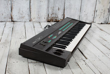 Load image into Gallery viewer, Yamaha Vintage 1980s DX7 Digital Synthesizer 61 Key Keyboard w Case &amp; Cartridges