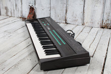 Load image into Gallery viewer, Yamaha Vintage 1980s DX7 Digital Synthesizer 61 Key Keyboard w Case &amp; Cartridges