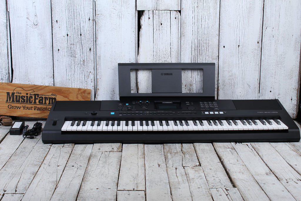 Yamaha PSR-E425 76 Key Portable Keyboard with 820 Voices and Pitch Bend with Power Supply