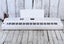 Yamaha DGX-670 White 88 Key Digital Portable Grand Piano with Sustain Pedal