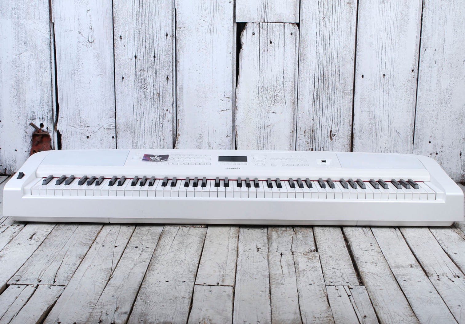 Yamaha DGX-670 White 88 Key Digital Portable Grand Piano with Sustain Pedal