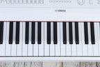 Yamaha DGX-670 White 88 Key Digital Portable Grand Piano with Sustain Pedal