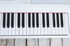 Yamaha DGX-670 White 88 Key Digital Portable Grand Piano with Sustain Pedal